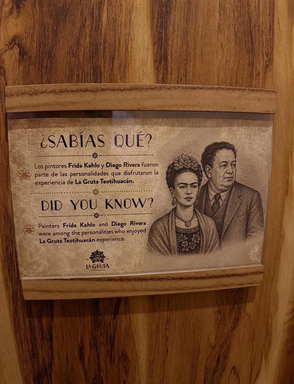 A plaque at La Gruta noting that Frida Kahlo and Diego Rivera dined there