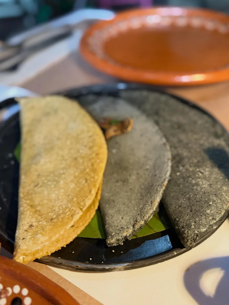 Freshly made quesadillas on the comal at La Gruta Teotihuacan